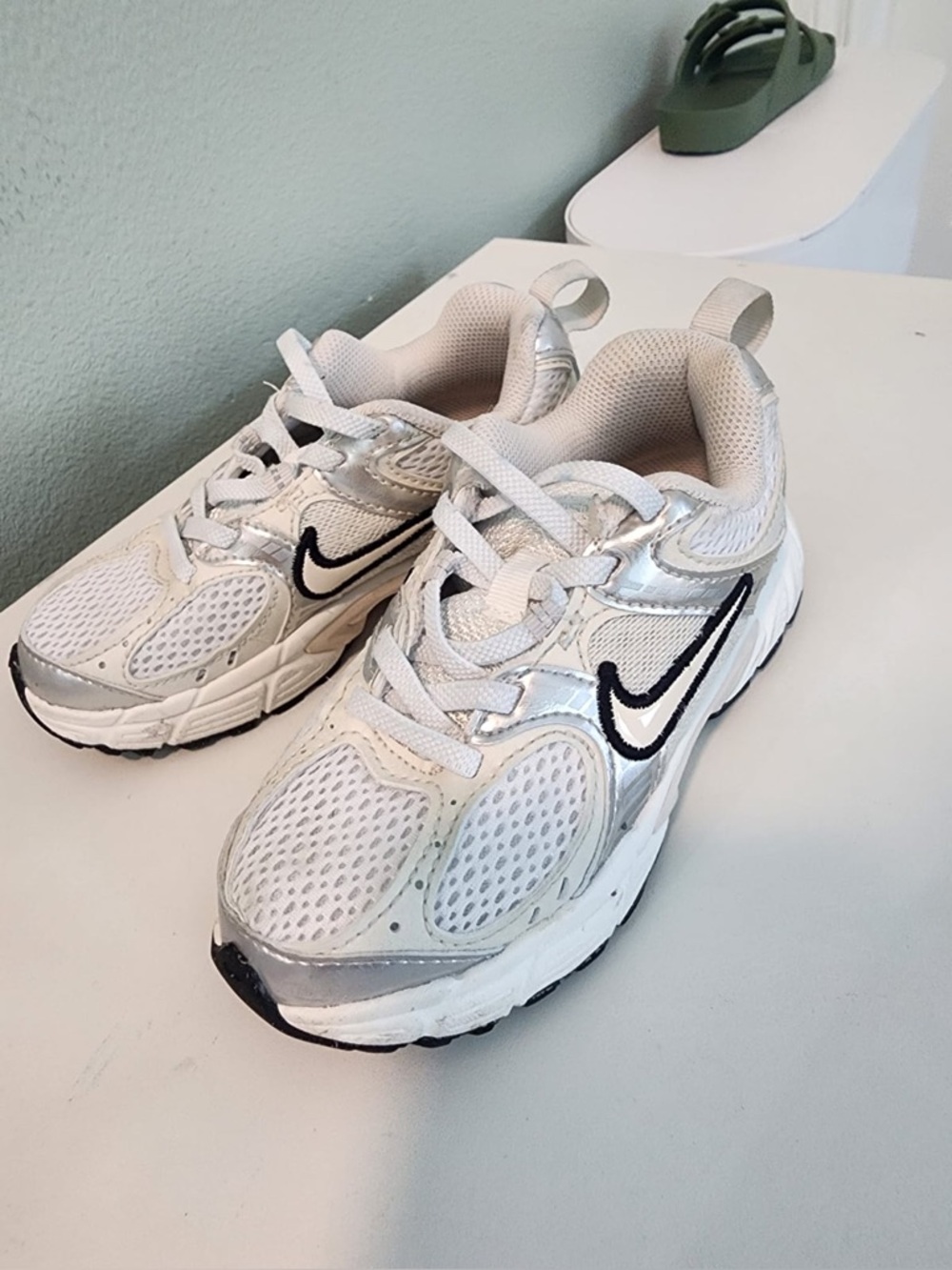 Nike Kids White and Black Mesh Athletic Sneakers with Silver Accents